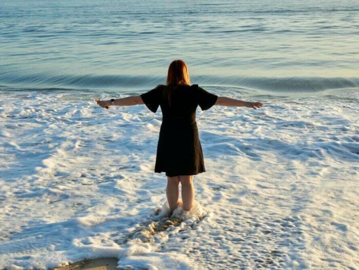 a person standing on a beach